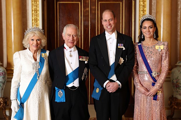 LONDON, ENGLAND - DECEMBER 05: (EDITORIAL USE ONLY) (L-R) Queen Camilla, King Charles III, Prince William, Prince of Wales and Catherine, Princess of Wales pose for a photograph ahead of The Diplomatic Reception in the 1844 Room at Buckingham Palace on December 05, 2023 in London, England. (Photo by Chris Jackson/Getty Images)
