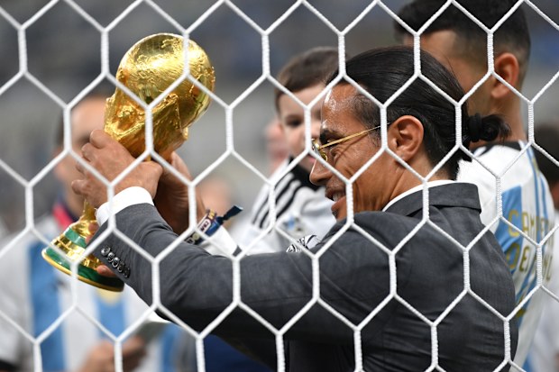 Nusret Goekce, Salt Bae, admires the FIFA World Cup Qatar 2022 Winner's Trophy after the final between Argentina and France at Lusail Stadium, Qatar, December 18, 2022. 