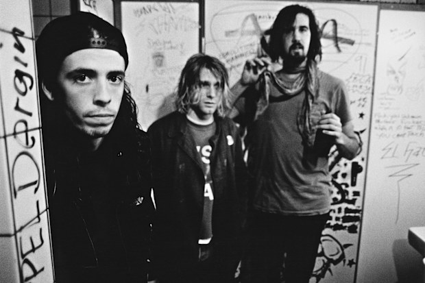 American rock group Nirvana, backstage in Frankfurt, Germany, 12th November 1991. Left to right: drummer Dave Grohl, singer and guitarist Kurt Cobain (1967 - 1994) and bassist Krist Novoselic. 