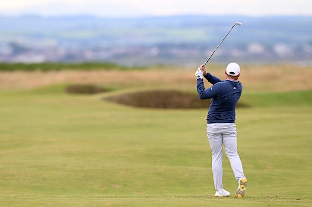 Tyrrell Hatton of England plays his second shot on the second hole during a practice round prior to The 152nd Open championship at Royal Troon on July 17, 2024 in Troon, Scotland. (Photo by Ross Kinnaird/Getty Images)