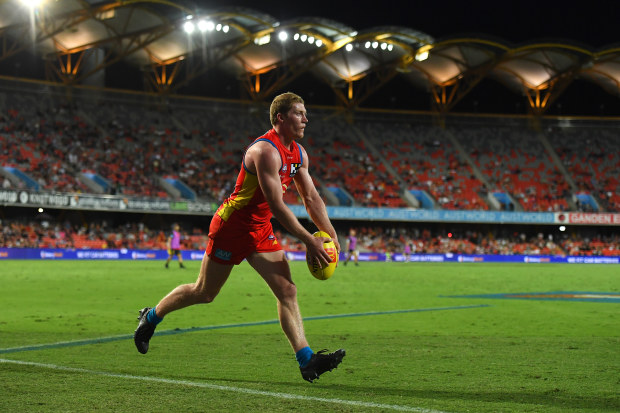 GOLD COAST, AUSTRALIA - MAY 06: Matt Rowell of the Suns kicks the ball during the round eight AFL match between the Gold Coast Suns and the Melbourne Demons at Heritage Bank Stadium, on May 06, 2023, in Gold Coast, Australia. (Photo by Albert Perez/AFL Photos via Getty Images)