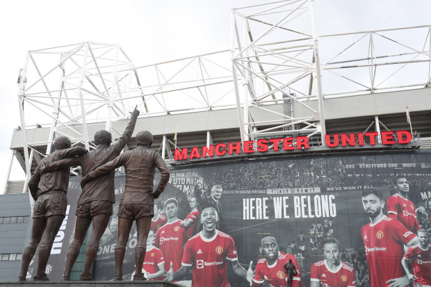 General view outside the stadium where the United Trinity statue is seen prior to the Premier League match between Manchester United  and  Leeds United at Old Trafford on August 14, 2021 in Manchester, England. (Photo by Alex Morton/Getty Images)