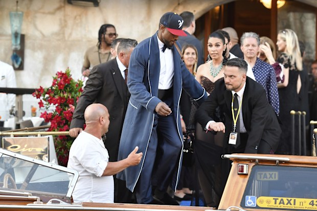 Husher leaves a hotel during celebrations for Jeff Bezos and Lauren Sanchez Bezos' wedding, in Venice, Saturday, June 28, 2025. (AP Photo/Luigi Costantini)