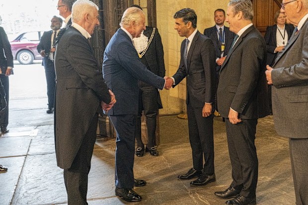 King Charles III meets UK Prime Minister Rishi Sunak (centre), Labour leader Sir Keir Starmer (right) and The Speaker of the House of Commons, The Rt Hon Sir Lindsay Hoyle (left) as the King and the Queen Consort attend Westminster Hall Reception at Westminster Hall on May 2, 2023 in London 