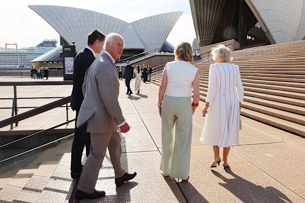 King Charles III and Queen Camilla walk along the Sydney Opera House Forecourt on October 22, 2024 in Sydney, Australia.