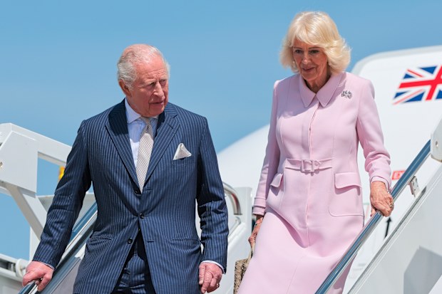 JOINT BASE ANDREWS, MD - APRIL 27:  King Charles III and Queen Camilla disembark their plane as they arrive on day one of their State Visit to the United States, on April 27, 2026 at Joint Base Andrews, Maryland.  The visit will include stops at the nation's capital, New York City, and Virginia, arranged to celebrate the United States of America's 250th anniversary of its independence. (Photo by Chip Somodevilla/Getty Images)