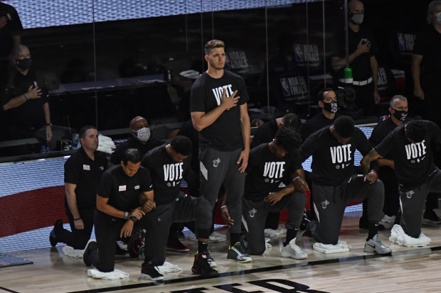 ORLANDO, FL - SEPTEMBER 30: Meyers Leonard #0 of the Miami Heat stands during the National Anthem before the game against the Los Angeles Lakers during Game One of the NBA Finals on September 30, 2020 in Orlando, Florida at AdventHealth Arena. NOTE TO USER: User expressly acknowledges and agrees that, by downloading and/or using this Photograph, user is consenting to the terms and conditions of the Getty Images License Agreement. Mandatory Copyright Notice: Copyright 2020 NBAE (Photo by Fernando