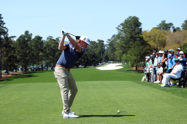Cameron Smith of Australia plays his shot from the first tee during a practice round prior to the Masters at Augusta National Golf Club.