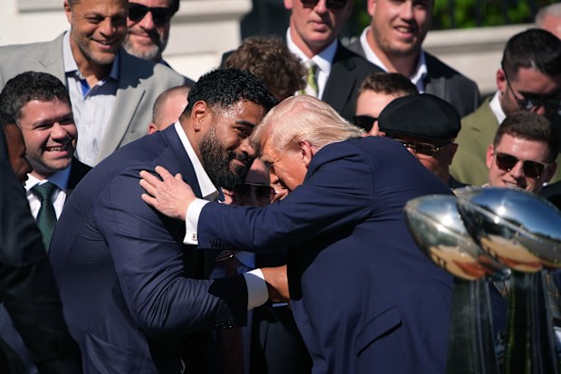 WASHINGTON, DC - APRIL 28: U.S. President Donald Trump greets Philadelphia Eagles offensive tackle Jordan Mailata at an event welcoming the 2025 Super Bowl Champion Philadelphia Eagles on the South Lawn of the White House on April 28, 2025 in Washington, DC. President Trump honored the Eagles after their second Super Bowl victory, following their first win in 2018. (Photo by Andrew Harnik/Getty Images)