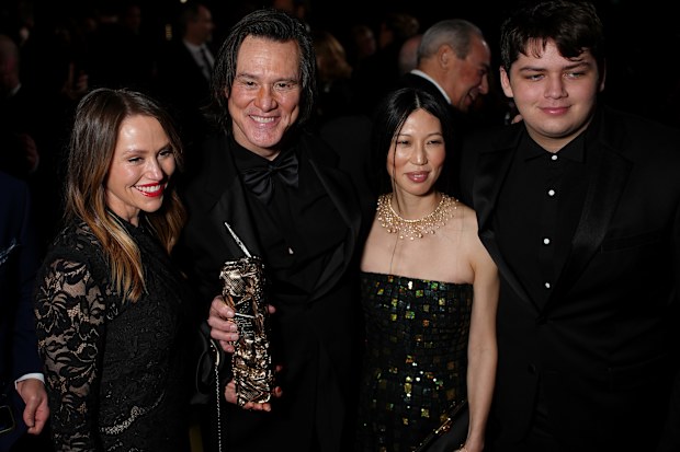 Jim Carrey, with daughter Jane Carrey, girlfriend Min Ah and grandson Jackson at the 51st Cesar Film Awards in Parus on February 26, 2026.