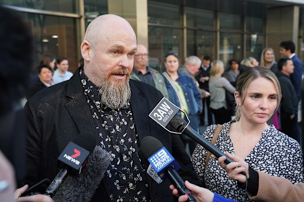 Shannon and Tracey Larsen, the parents of the victim Georgia Larsen, speak to the media outside the County Court of Victoria in Melbourne.