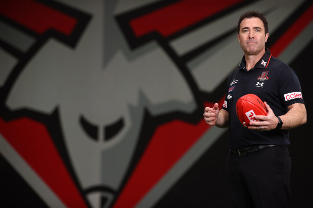 Brad Scott poses for the first time in black and red.