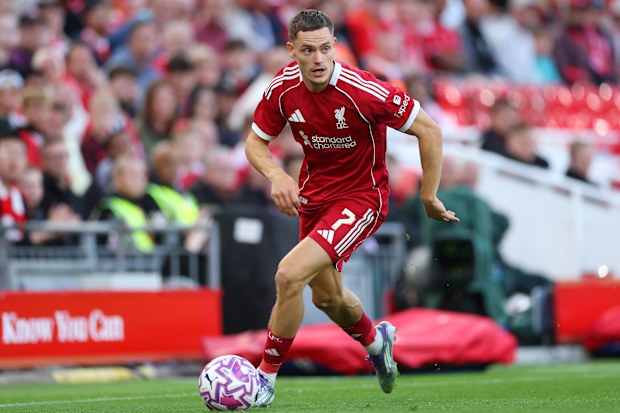 Florian Wirtz of Liverpool runs with the ball.