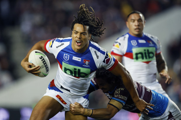 SYDNEY, AUSTRALIA - JULY 16: Dominic Young of the Knights is tackled  during the round 18 NRL match between the Manly Sea Eagles and the Newcastle Knights at 4 Pines Park, on July 16, 2022, in Sydney, Australia. (Photo by Mark Evans/Getty Images)