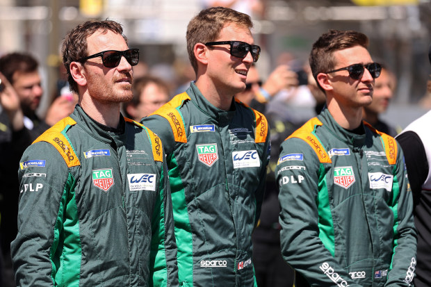 Actor Michael Fassbender (left) with Zacharie Robichon and Matt Campbell at the 2022 24 Hours of Le Mans.