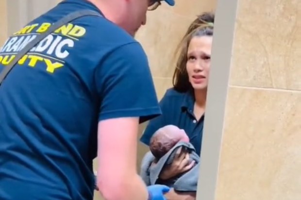 Woman gives birth in gas station toilet cubicle. 