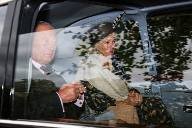 King Charles III and Queen Camilla arrive by car at Crathie Kirk, August 2025