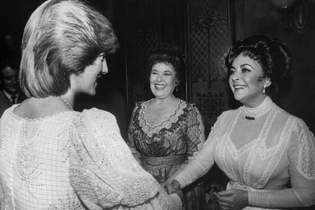 Princess Diana meets Elizabeth Taylor backstage at the Victoria Palace Theatre after a charity premiere of 'The Little Foxes', London, 1982