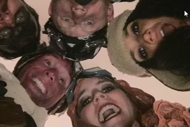 Prince Harry, Meghan Markle, Princess Eugenie and Jack Brooksbank at a 2016 Halloween party.