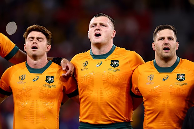 (From left) Andrew Kellaway, Angus Bell and Dave Porecki of Australia sing their national anthem prior.