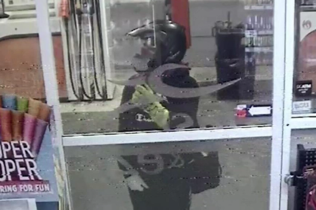 The service station worker was taken to hospital and police are seeking public assistance to catch then attackers.