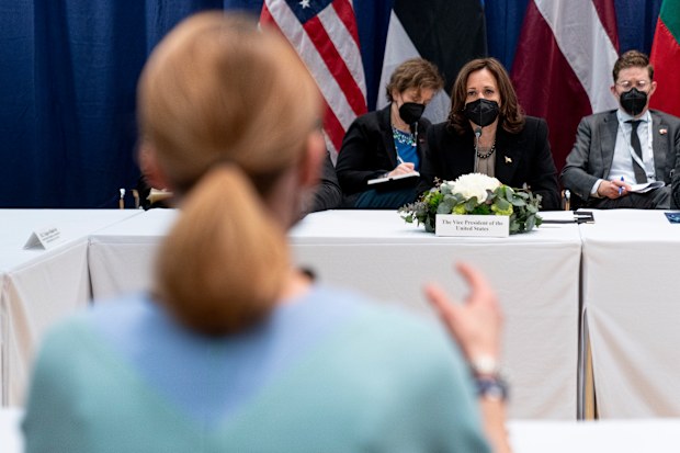 Vice President Kamala Harris, listens as  Estonia's Prime Minister Kaja Kallas, foreground, speaks during a meeting at the Munich Security Conference, Friday, Feb. 18, 2022, in Munich.