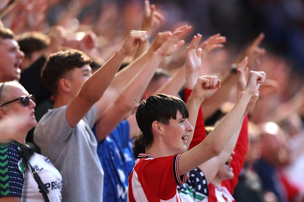 Sunderland supporters support their team during the Premier League match against West Ham.