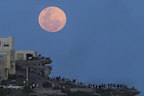 <p>The supermoon at Bondi loomed at its largest just before 10.30pm on Thursday.</p><p>The glowigng orb was also seen across all other states and territories. </p>