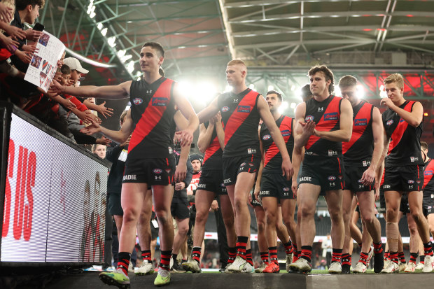 MELBOURNE, AUSTRALIA - AUGUST 05: The Bombers celebrate after they defeated the Eagles during the round 21 AFL match between Essendon Bombers and West Coast Eagles at Marvel Stadium, on August 05, 2023, in Melbourne, Australia. (Photo by Robert Cianflone/Getty Images)