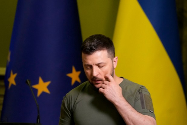 Ukraine President Volodymyr Zelenskyy leaves after a joint press conference with European Commission President Ursula von der Leyen in Kyiv, Ukraine, Saturday, June 11, 2022. 
