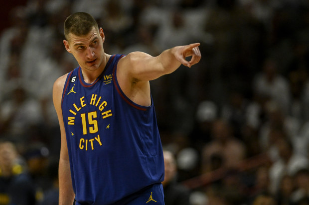 MIAMI, FL - JUNE 7: Nikola Jokic (15) of the Denver Nuggets points like a large general in the fourth quarter of the Nuggets' 104-94 win over the Miami Heat during Game 3 of the NBA Finals at the Kaseya Center in Miami on Wednesday, June 7, 2023. (Photo by AAron Ontiveroz/The Denver Post)