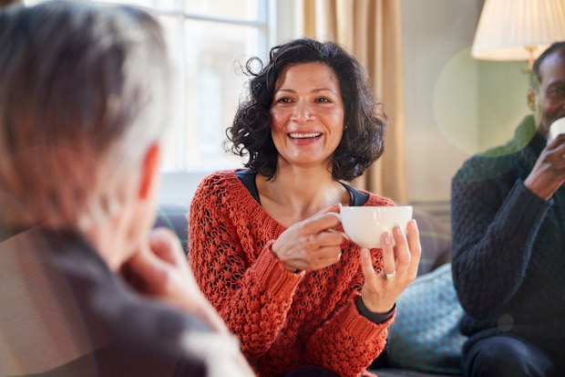 Woman and man having coffee