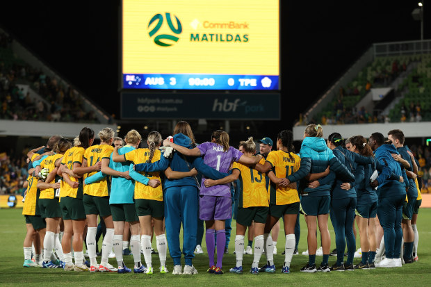 The Matildas huddle after their win.