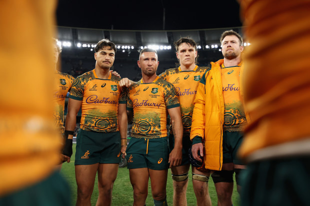 Quade Cooper of the Wallabies talks to teammates in a huddle after losing The Rugby Championship & Bledisloe Cup match against the All Blacks.