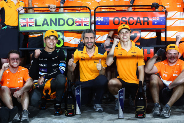 Lando Norris (left) with McLaren team principal Andrea Stella (middle) and Oscar Piastri (right).