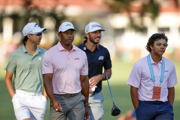  Tiger Woods of the United States, his son, Charlie Woods, Min Woo Lee of Australia and Max Homa of the United States walk off the second tee during a practice round prior to the U.S. Open at Pinehurst Resort on June 11, 2024 in Pinehurst, North Carolina. (Photo by Alex Slitz/Getty Images)