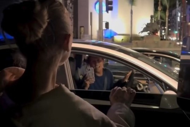 Ariana Grande surprises a fan singing her song in their car