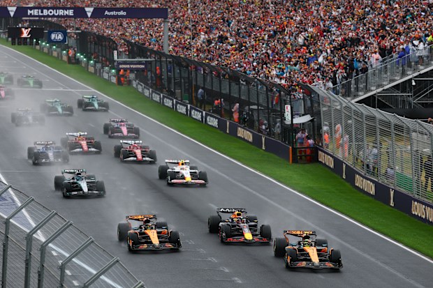Lando Norris of Great Britain driving the (4) McLaren MCL39 Mercedes leads Oscar Piastri of Australia driving the (81) McLaren MCL39 Mercedes Max Verstappen of the Netherlands driving the (1) Oracle Red Bull Racing RB21 and the rest of the field at the start during the F1 Grand Prix of Australia at Albert Park Grand Prix Circuit on March 16, 2025 in Melbourne, Australia. (Photo by Clive Rose/Getty Images)