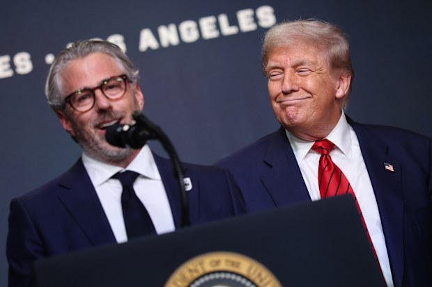 U.S. President Donald Trump and Casey Wasserman during an executive order signing ceremony in the South Court Auditorium in the Eisenhower Executive Office Building on August 5, 2025 in Washington, DC. 