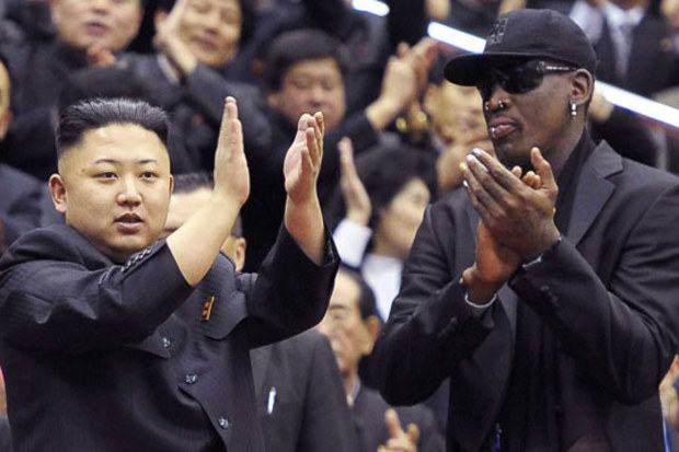Kim Jong Un and Dennis Rodman applaud during a game between the Harlem Globetrotters team and North Korean University of Physical Education players. (AAP)