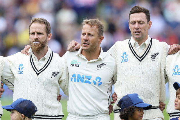 Kane Williamson (from left), Neil Wagner and Matt Henry of New Zealand sing the national anthem during day one of the first Test in Wellington.