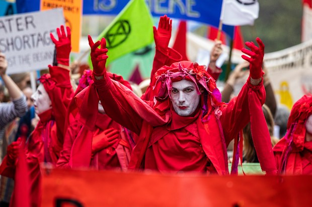 Activists from Extinction Rebellion participate in a protest in Perth, Friday, October 11, 2019.