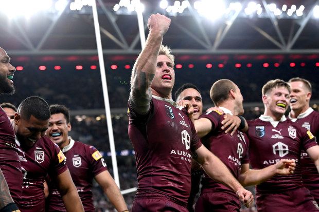 BRISBANE, AUSTRALIA - JUNE 21: Cameron Munster of Queensland celebrates a try by team mate Hamiso Tabuai-Fidow of Queensland during game two of the State of Origin series between the Queensland Maroons and the New South Wales Blues at Suncorp Stadium on June 21, 2023 in Brisbane, Australia. (Photo by Bradley Kanaris/Getty Images)