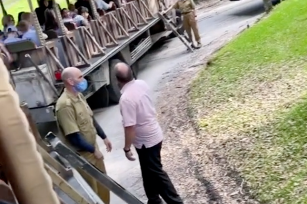 Disney Animal Kingdom staff set up ladders to evacuate park visitors.