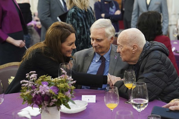 Britain's Kate, Princess of Wales speaks with Steven Frank, center, and Maurice Peltz at a ceremony in London, Monday Jan. 27, 2025, to commemorate Holocaust Memorial Day and the 80th anniversary of the liberation of Auschwitz-Birkenau the former Nazi German concentration and extermination camp. (Arthur Edwards/Pool via AP)
