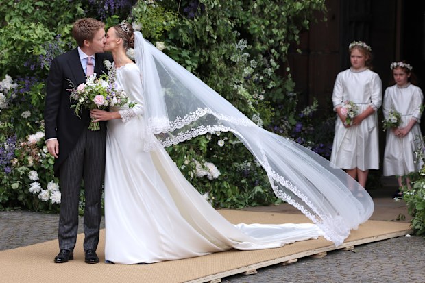 Hugh Grosvenor, Duke of Westminster and Olivia Grosvenor, Duchess of Westminster kiss after their wedding ceremony at Chester Cathedral on June 07, 2024 in Chester, England 