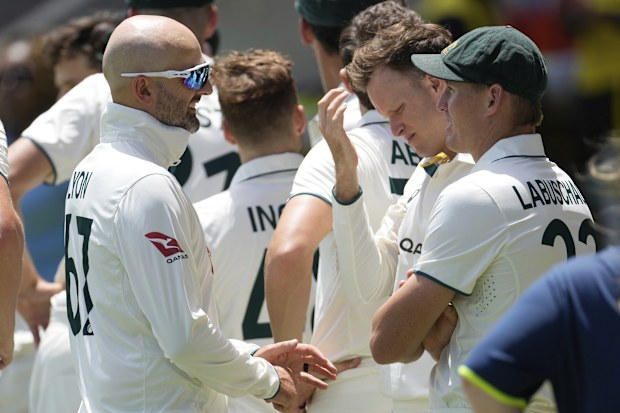 Nathan Lyon (left) talks to Marnus Labuschagne before play on day one of the third Test between Australia and the West Indies in 2025.