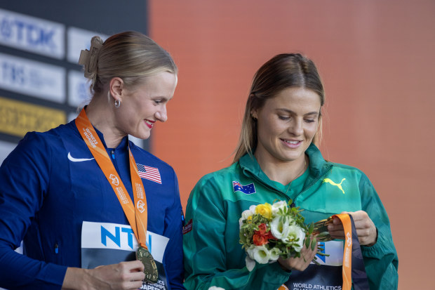 BUDAPEST, HUNGARY:  August 24:   Nina Kennedy of Australia and Katie Moon (left), of the United States, joint gold medal winners in the Women's Pole Vault Final, on the podium during the medal ceremony at the medal plaza during the World Athletics Championships, at the National Athletics Centre on August 24, 2023 in Budapest, Hungary. (Photo by Tim Clayton/Corbis via Getty Images)