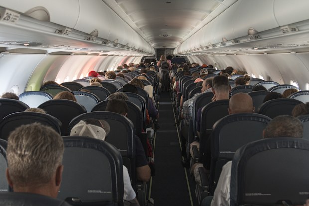 Passengers on a full plane 