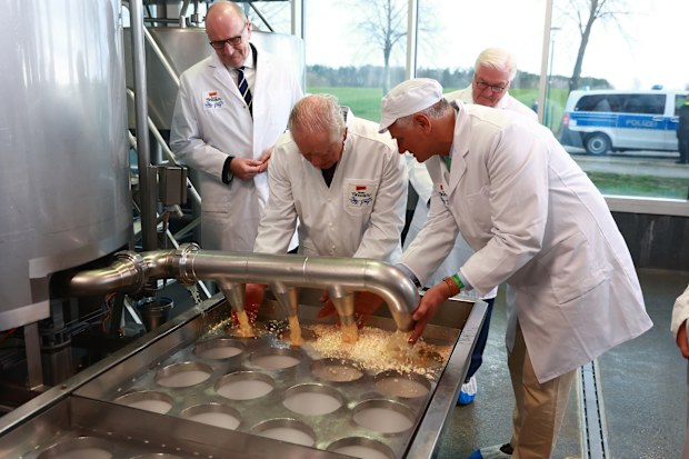 King Charles III with German President Frank-Walter Steinmeier visits the Brodowin eco-village in Chorin on March 30,2023 in Brandenburg, Germany. 
